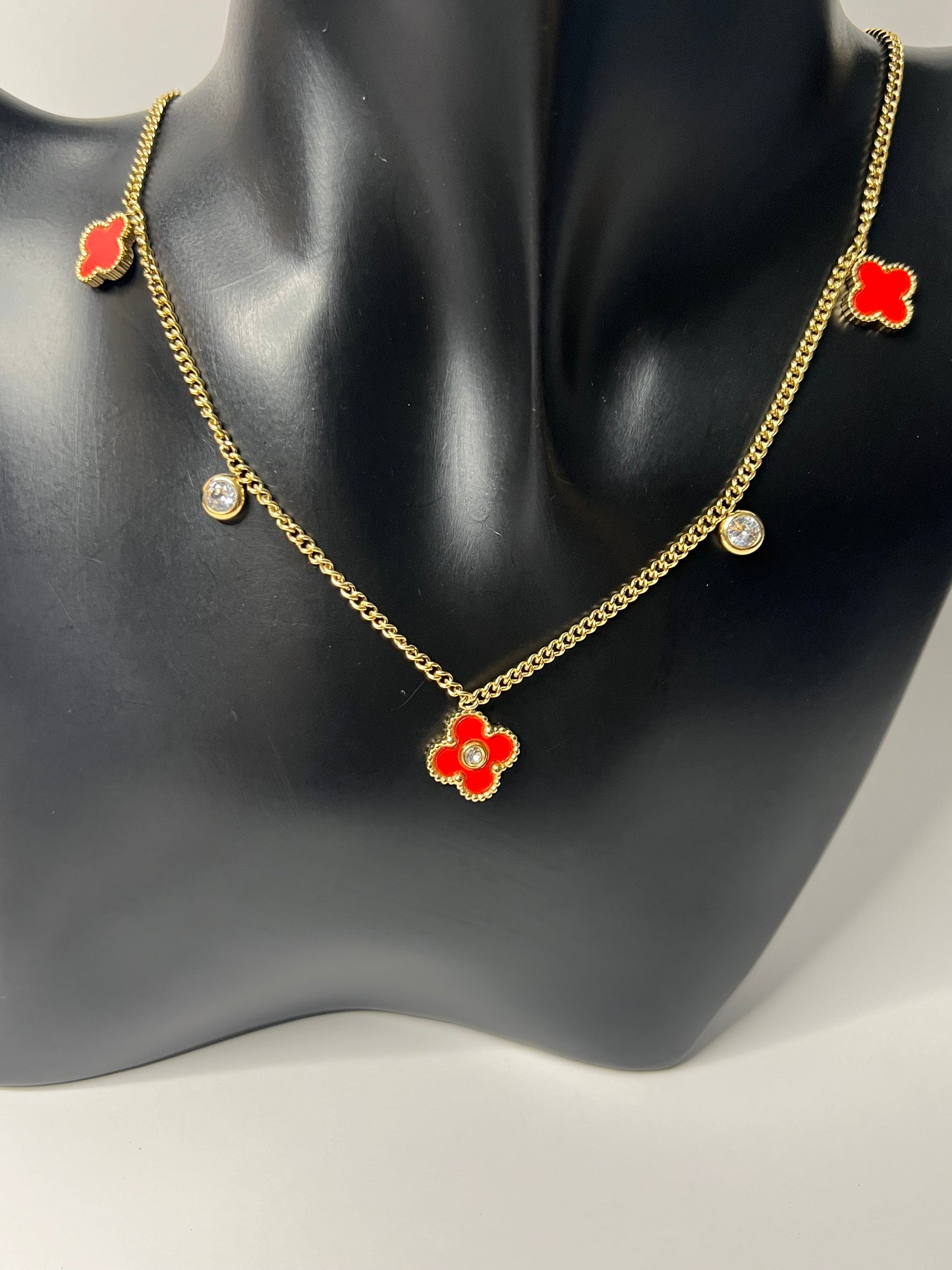 Van Cleef Gold Necklace with a red Clovers