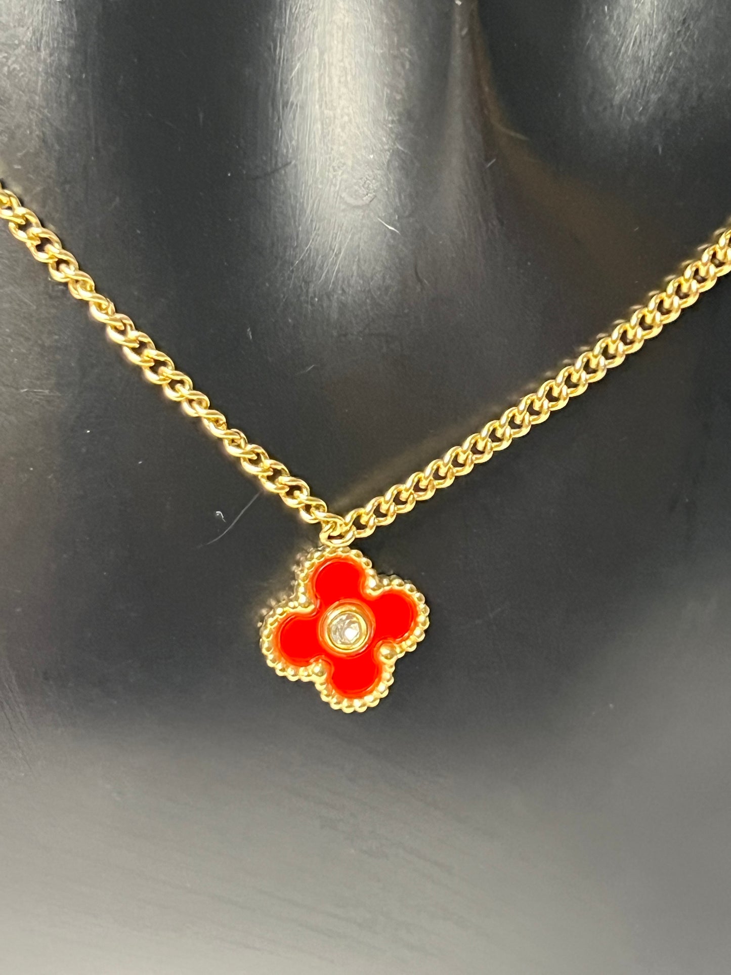 Van Cleef Gold Necklace with a red Clovers