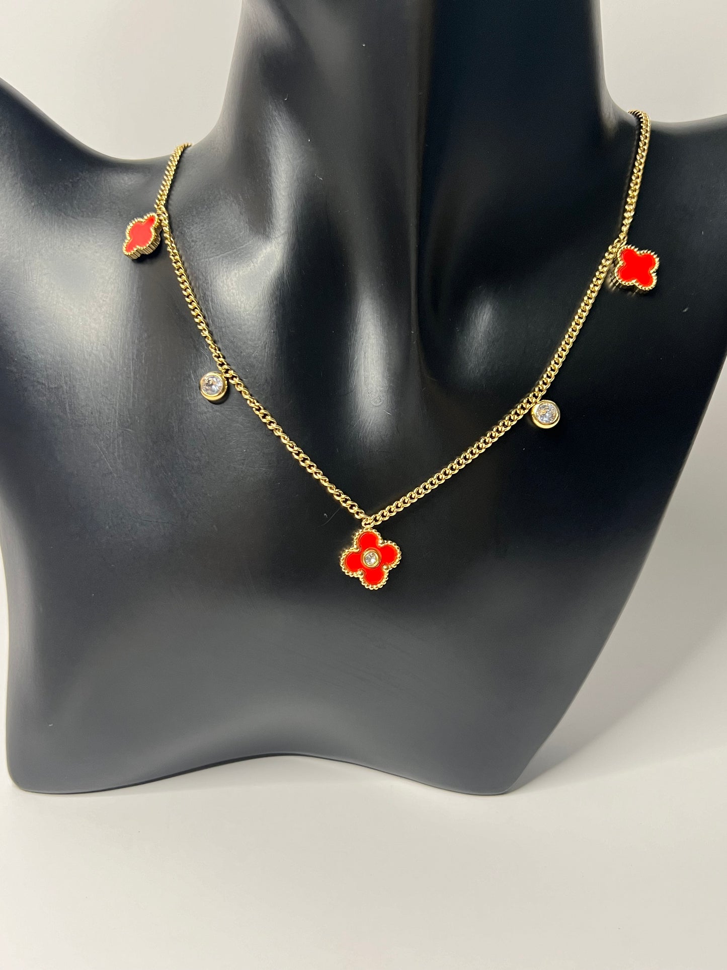 Van Cleef Gold Necklace with a red Clovers