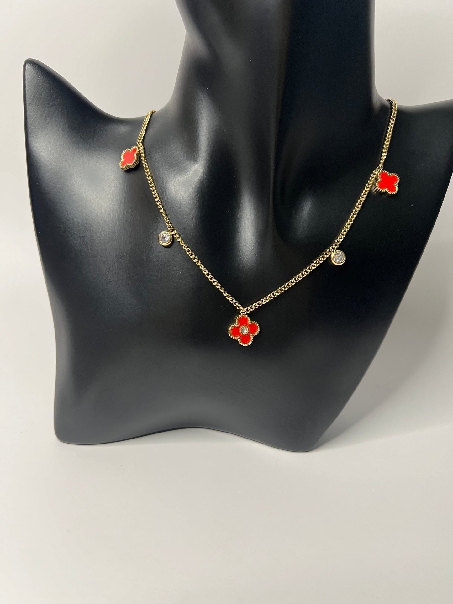 Van Cleef Gold Necklace with a red Clovers