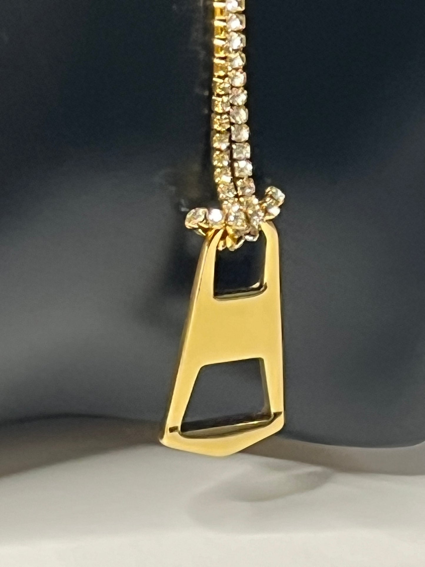 Golden Chocker with a Zipper Pendant