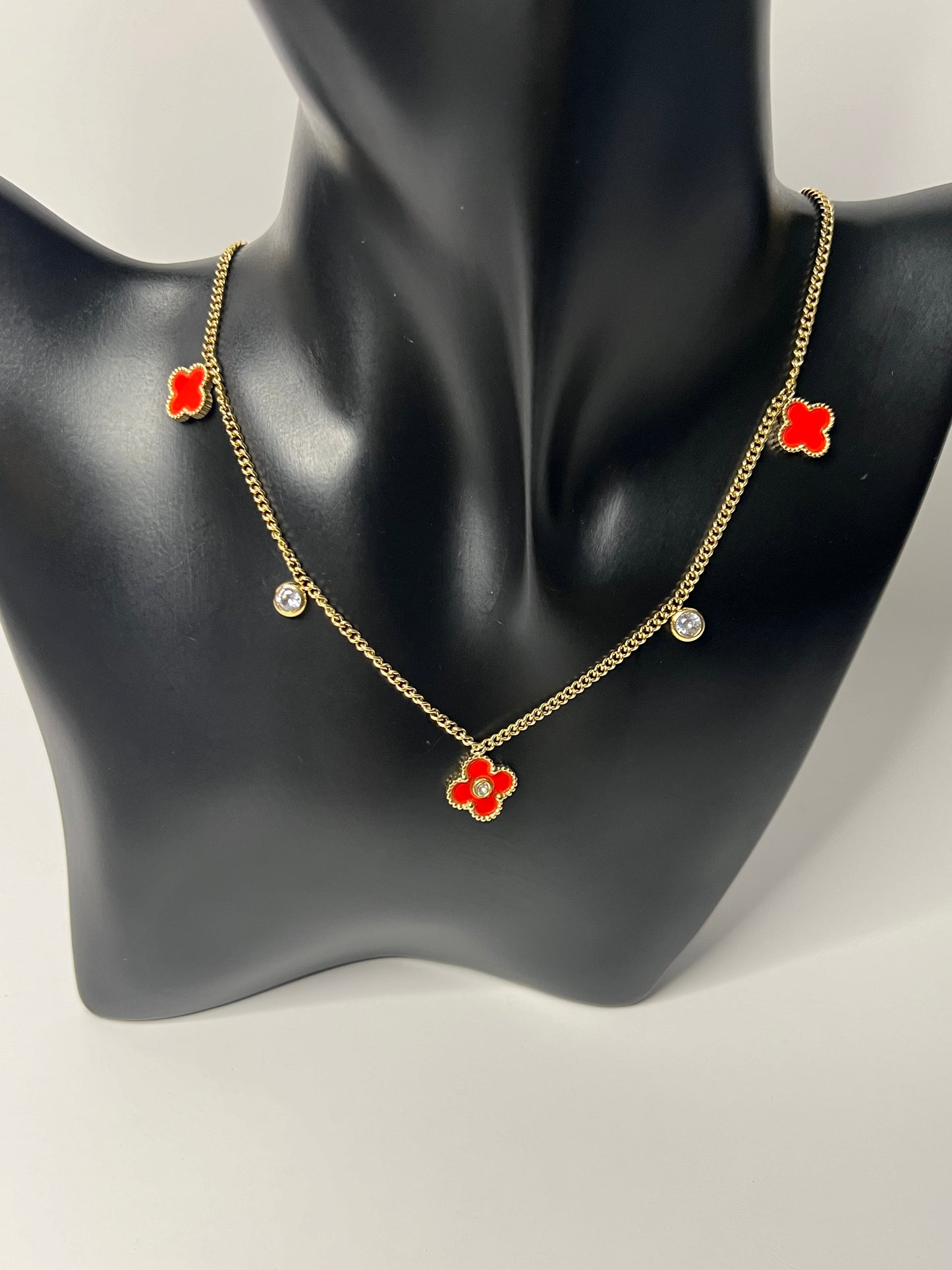 Van Cleef Gold Necklace with a red Clovers