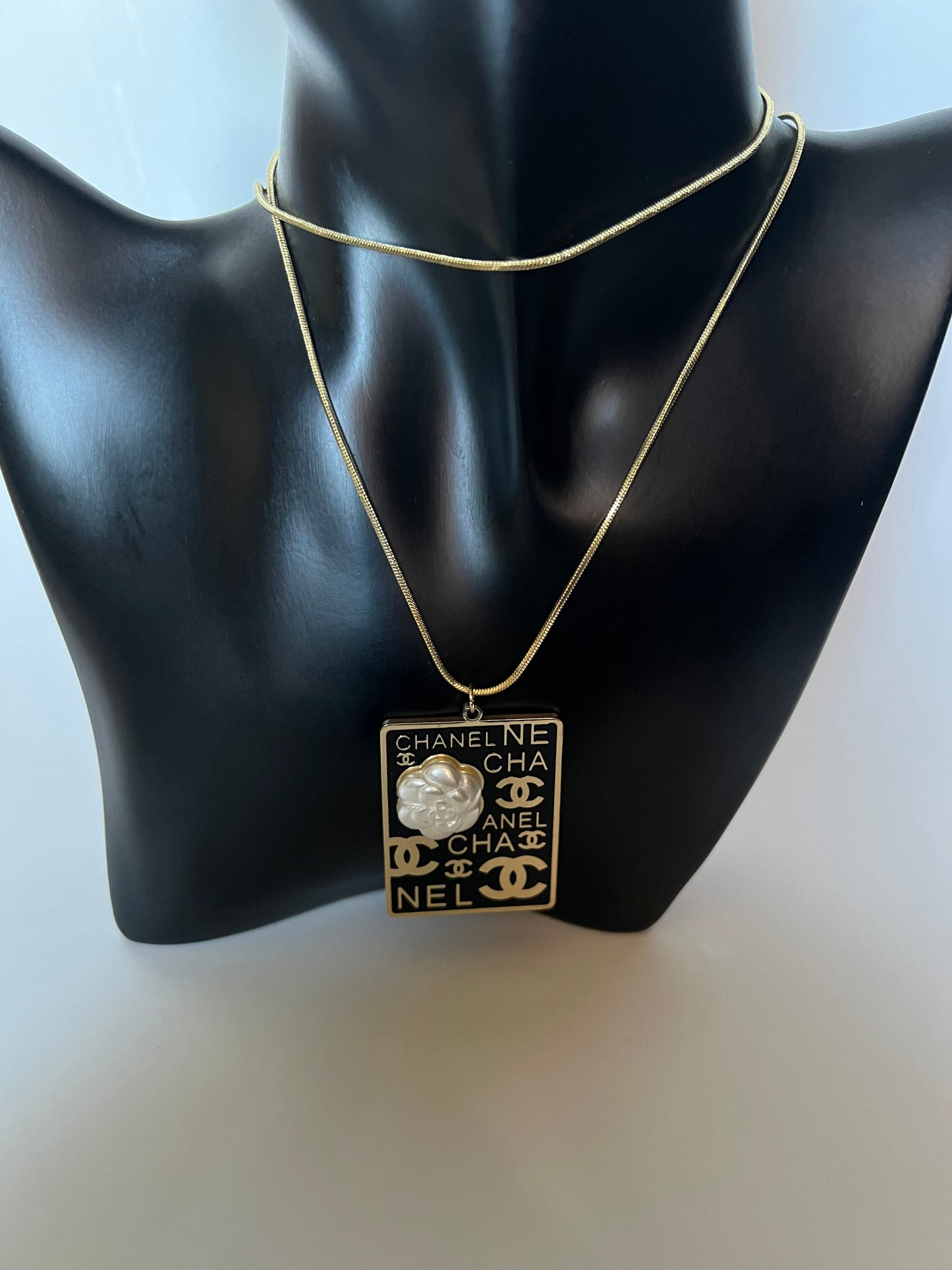 Long Gold Necklace with Golden and Black pendant